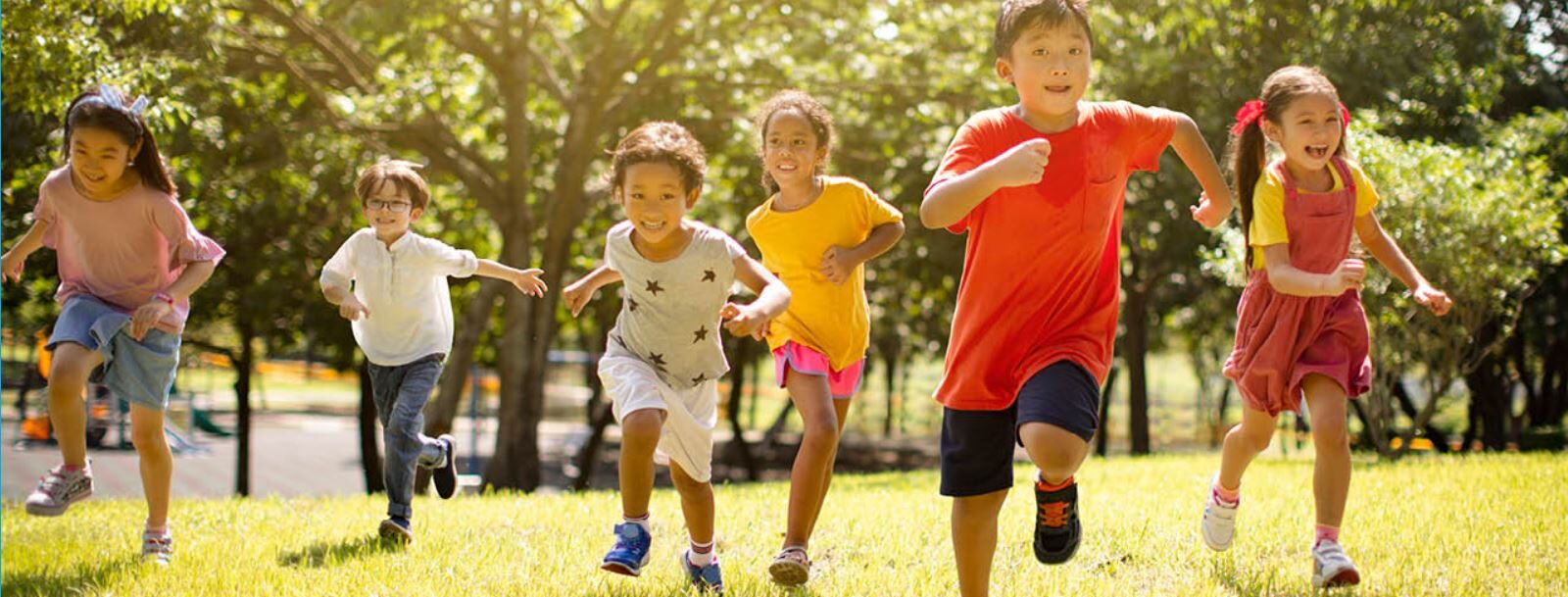 Children running in field - Shape Your Future
